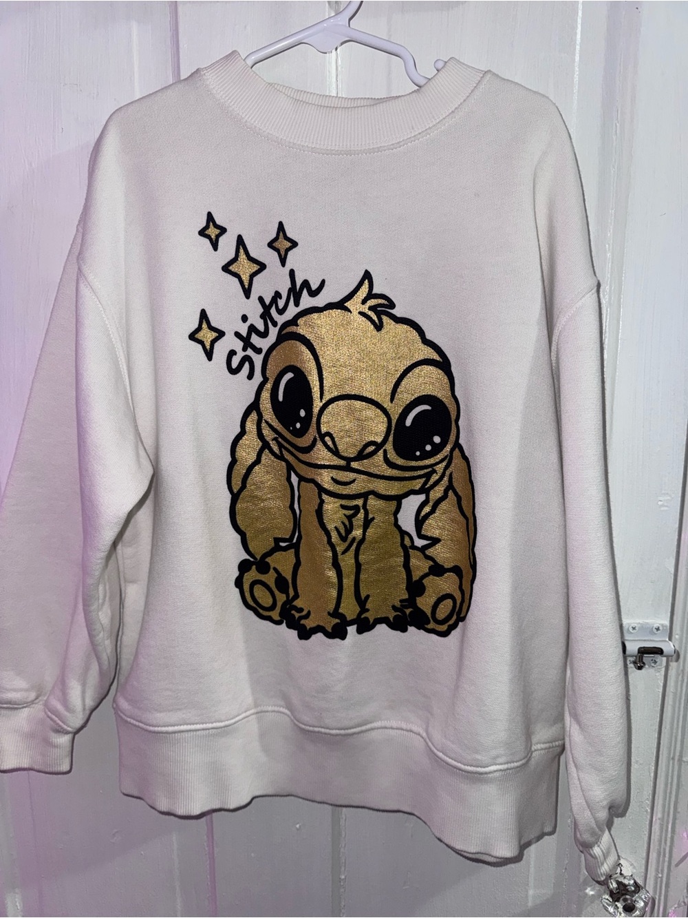 Zara White Sweatshirt with Gold Stitch Graphic